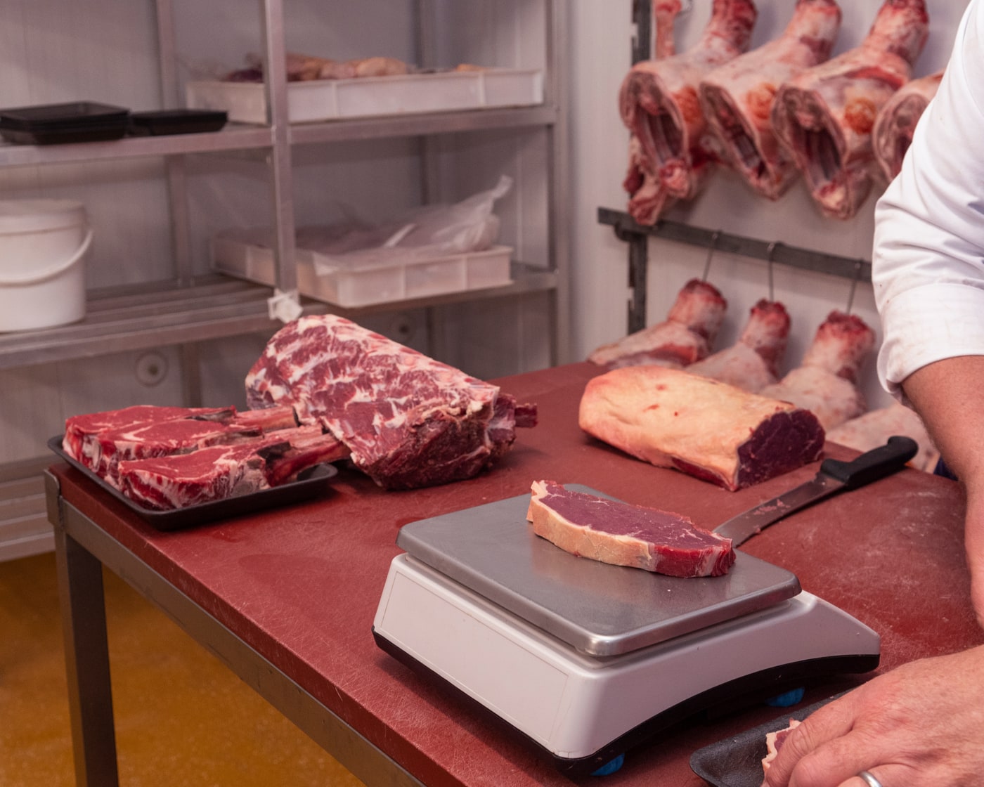 A prepared steak on a scale at the Midland Foods cutting bench